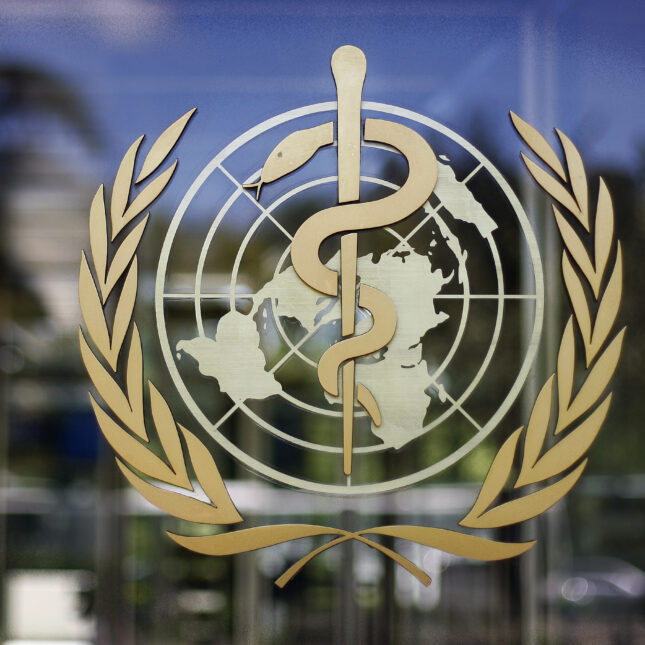 World Health Organization logo is seen on a window at the WHO headquarters in Geneva. -- Infectious disease coverage from STAT