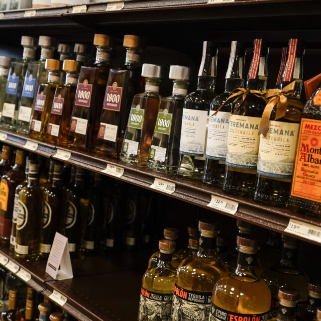 File photograph of glass liquor bottles on a store shelf